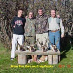 Four Men Standing With Their Antelope Hunts in Montana