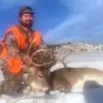 An Elk Ridge Outfitters guest poses with the Antelope he took down during a 2022 hunt